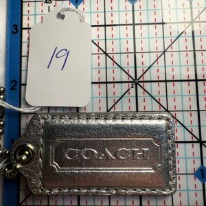 Coach Metallic Silver Keychain